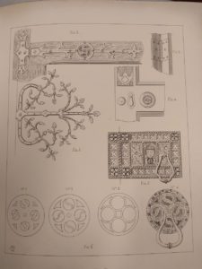Page of a book showing line drawings of church door handles and ornamental hinges, in the neo-gothic style