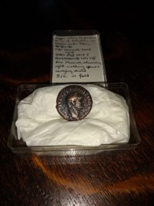 Dupondius of Domitian, in a small finds box, with label